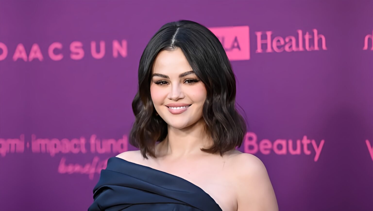 Selena Gomez Net Worth 2025 with headline about net worth estimates,Selena Gomez smiling at event, Rare Beauty valuation discussed,Portrait of Selena Gomez highlighting 2025 net worth range,Selena Gomez on red carpet amid billionaire rumors in 2025,Close-up of Selena Gomez with text on Rare Beauty stake,Selena Gomez press photo referencing 2025 fortune estimate,Selena Gomez brand founder image with net worth overview,Selena Gomez posing as article covers $700M–$1B+ estimates,Selena Gomez lifestyle shot tied to Rare Beauty success,Selena Gomez promotional image with 2025 wealth analysis